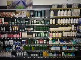 many different types of hair products on the shelves in the store