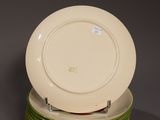 several plates stacked on top of each other on a table