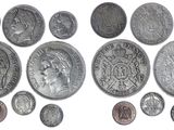 an image of a group of silver coins on a white background