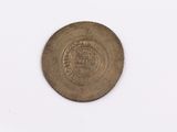 an old coin with a picture of a man on it