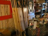 a cart full of books and other items in a room