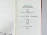someone is holding a book open to a page of text