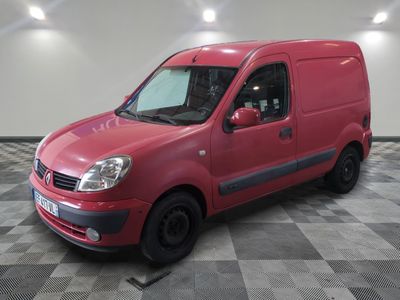 a picture of a red van parked on a checkered floor