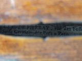 a close up of a piece of wood with a label on it