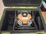an open case with a toy car inside of it