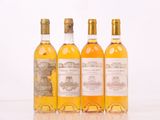 trois bouteilles de vin posées l'une à côté de l'autre sur une table
