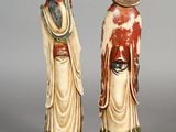 pair of asian figurines of a man and a woman