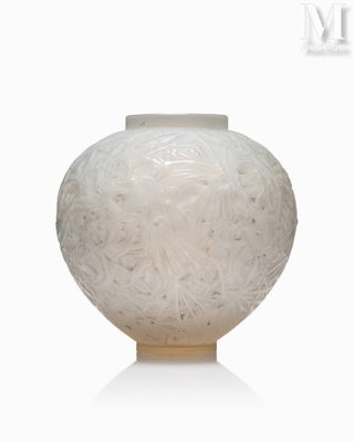 a white vase that has a lot of white stuff in it
