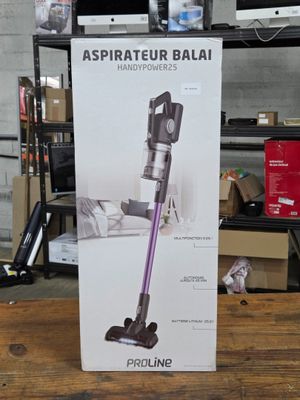 la boîte de l'aspirateur est ouverte sur la table