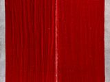 an image of a red piece of cloth hanging on a wall