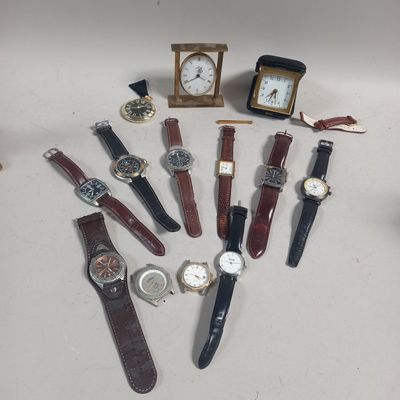 many different types of watches on the table
