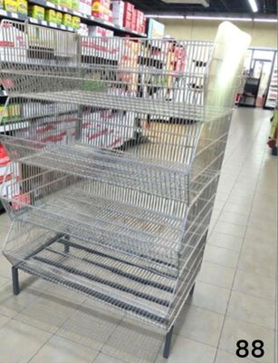 a metal rack in the middle of a grocery store