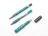 two pens and a rollerball pen sitting on top of a white surface