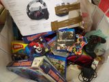 a paper bag filled with toys and other items