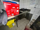 a red box sitting on top of a counter in a kitchen