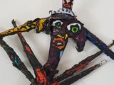 a picture of a sculpture made out of sticks and paper