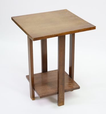 an image of a small wooden table with a shelf underneath it