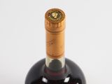 a bottle of wine that is sitting on a table