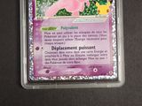 a pokemon card in a plastic container on a table