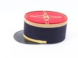 a red and blue hat on a white surface