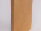 an image of a brown book sitting on top of a white surface