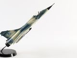 a model of a fighter jet sitting on a stand