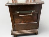 an old wooden dresser with a mirror on top of it