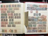 a book with a lot of stamps inside of it