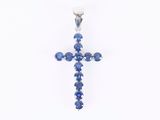 an image of a cross made out of blue sapphire stones