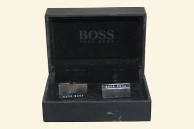 hugo boss cufflinks in a black box with matching cufflinks