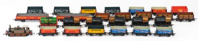 a lot of small toy trains on a white surface