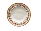 a white plate with orange flowers on it on a white surface