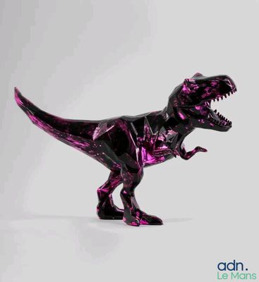 a purple toy dinosaur that is standing on a white surface