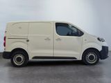 a picture of a white van parked in a garage