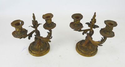 pair of antique brass candlesticks with birds on them