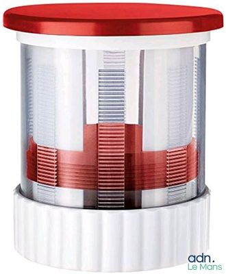 a red and white light that is on top of a table
