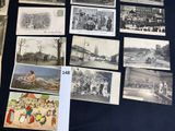 a lot of old photos on the table together