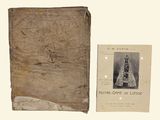 an old book with a picture of a tower on it