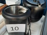 a lot of pots and pans on a table
