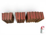 a set of three books sitting on top of each other