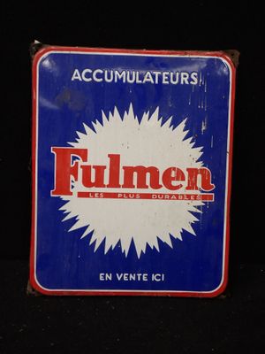 une image représentant une enseigne bleue et blanche sur laquelle figure le mot « fumer »