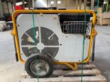 a small air conditioner sitting on a pallet in a warehouse