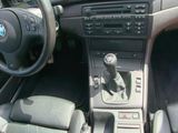 dashboard of a car with a steering wheel and dashboard controls