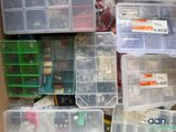 many plastic containers filled with different types of electronics