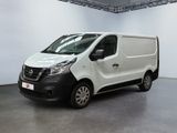 the white van is parked in a large room