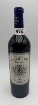 l'image d'une bouteille de vin posée sur une table