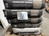 several bags of cement stacked on top of each other on a pallet