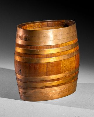 a wooden barrel that is sitting on a table
