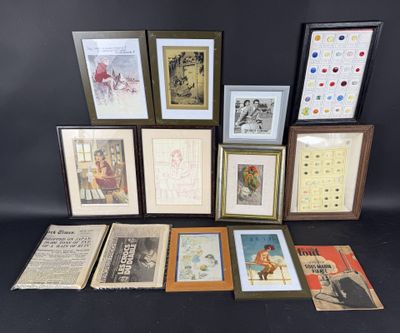 a lot of framed pictures on the table