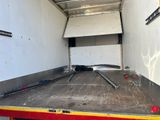 a truck with a flat bed in the back of it